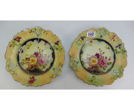 Pair Carltonware shaped ribbon plates gilded and decorated with flowers, diameter 24cm (2)