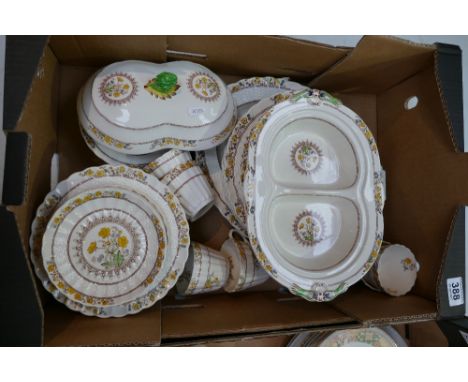 A collection of Spode dinnerware in the Buttercup design to include covered veg bowls, side plates, dinner plates, serving pl