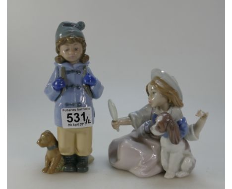 Nao figure of young boy backpacker and similar figure of girl looking into mirror (2)