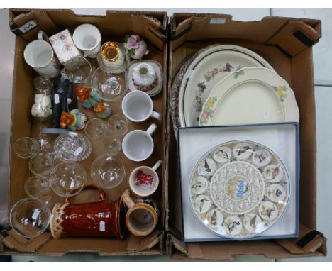 A mixed collection of items to include commemorative cups, glassware, resin figure of Charlie Chaplin, Wedgwood calendar plat