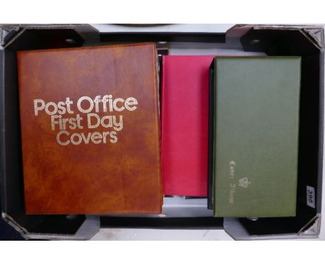 A large collection of first day covers, stamp albums, etc 