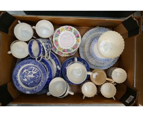 A mixed collection of dinner and teaware items to include unmarked blue and white patterned item together with British Anchor