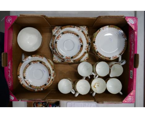 A good collection of Fenton gilded dinnerware to include side plates, cups, saucers, etc 