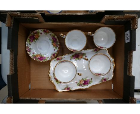 A collection of Royal Albert Old Country Rose items to include four cups and saucers, and two serving platters 