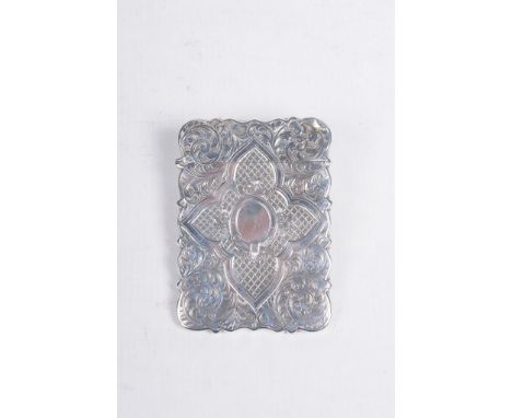 A Victorian silver card case
Of rectangular form with gadrooned rim, finely engraved with scrolling foliate tendrils, before 