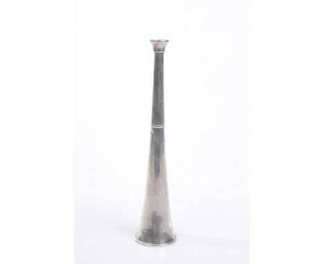A Victorian silver hunting horn
Of tapered form with bevelled cast mouth piece, 22.5cm long, London, 1890. CONDITION REPORT: 