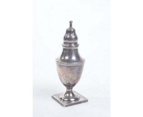 A Victorian silver sugar caster
The pierced and fluted top extending to a shouldered ovoid body, rising from a pedestal stem 