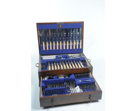 An early 20th Century oak cased Viners canteen of cutlery
The stainless steel with faux ivory handles, comprising twelve dinn