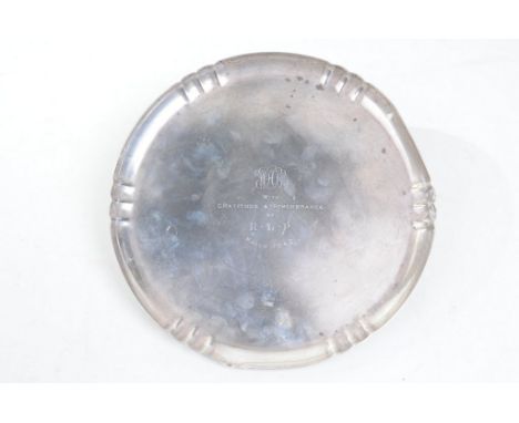 A George V silver tray
Of circular form with scalloped rim, the central field engraved 'With Gratitude and Remembrance of R.L