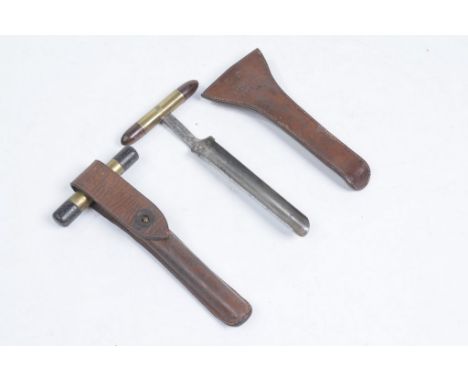 Two leather cased steel brass and hardwood cheese irons or testers
Each circa 1900 the first with a brass and rosewood bullet