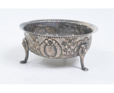 A Victorian silver tripod pedestal bowl
Of circular form with an everted rim chased with a continuous farming scene detailed 