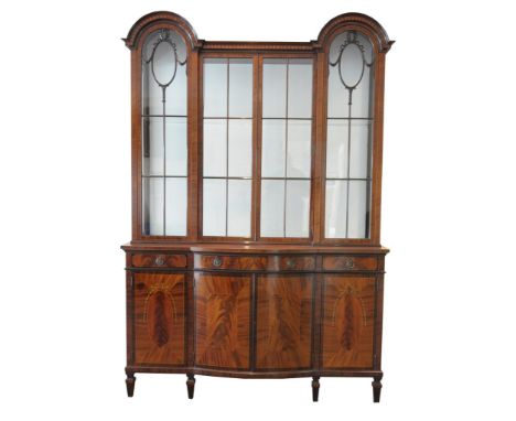 A fine Edwardian inlaid mahogany dome top display cabinet
The double dome top with an ovolo cornice above a frieze inlaid wit