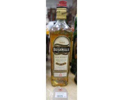 Five bottles mixed Lot Whiskey and Whisky comprising 1 bottle Bushmills Triple Distilled “White Label” Irish Whiskey 40%, 2 b