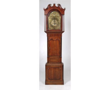 An early 19th Century oak and mahogany longcase clock signed Baker Appleby
With a 35cm brass arched dial with subsidiary seco