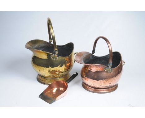 A Victorian copper swing handled coal helmet
Of typical form with a brass handle and a shovel with an ebonised handle, and a 