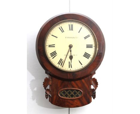 A Victorian mahogany drop dial wall clock, Signed Dibben & Co., 189 Sloane Street
With a 28.5cm white dial with Roman numeral