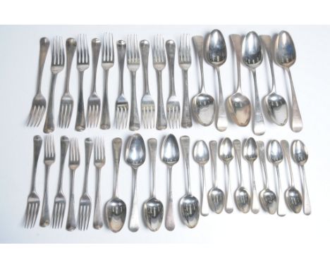 A Composite collection of Georgian silver flatware 
Comprising six dinner forks, unidentified maker, London, 1814, total weig