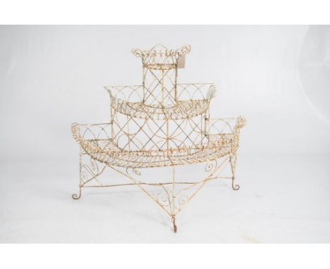 A painted wirework conservatory planter late 19th / 20th Century
Of scrollwork design with three half-moon tiers, each with w