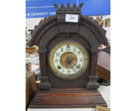 &nbsp;A 19th century mantle clock, with carved decoration, height 15ins