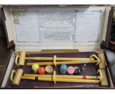 A boxed Bussey's Table Croquet set, with four mallets, balls etc
