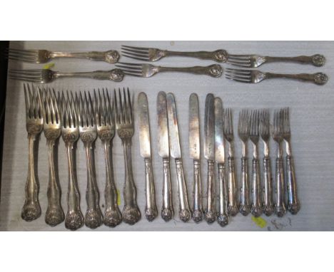 A set of six silver dinner forks, weight 20oz, together with a set of six silver dessert forks, weight 11oz, a set of six sil