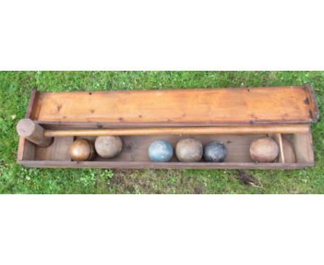 A Jaques &amp; Son London wooden box, containing a wooden croquet mallet and 6 balls