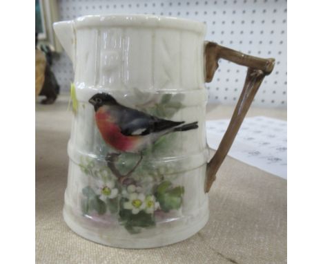 A Royal Worcester barrel moulded jug, decorated with a Chaffinch by Powell, height 3.75ins, together with a Royal Worcester T