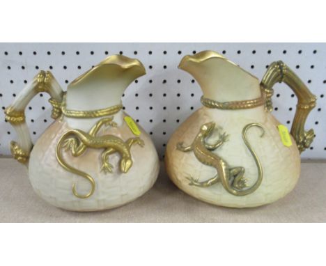 Two Royal Worcester blush ivory jugs, with basket weave body and applied with a gilt lizard, shape number 1714, height 6ins