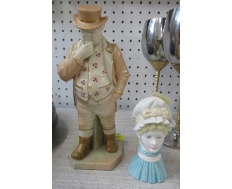 A Royal Worcester figure, John Bull, together with a Royal Worcester candle snuffer, Mop Cap