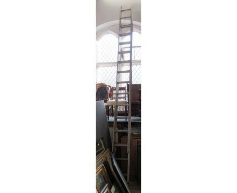 An aluminium extending ladder