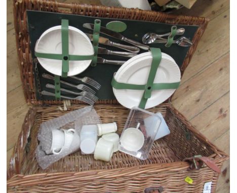 A Harrods picnic hamper, with china plated and silver plated Kings pattern cutlery