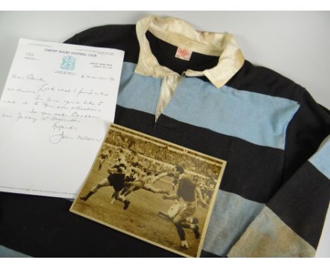 A 1950s CARDIFF RFC JERSEY NUMBER 2 ISSUED TO GARETH GRIFFITHS with traditional black and blue hoops, white collar, no crest,