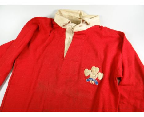A 1950 WALES RUGBY UNION SCHOOLS MATCH WORN JERSEY NUMBER 5, ISSUED TO GARETH GRIFFITHS with white collar, long sleeves, embr