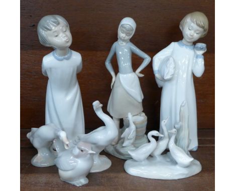 Four Lladro figures, two Nao figures and one other, (7)