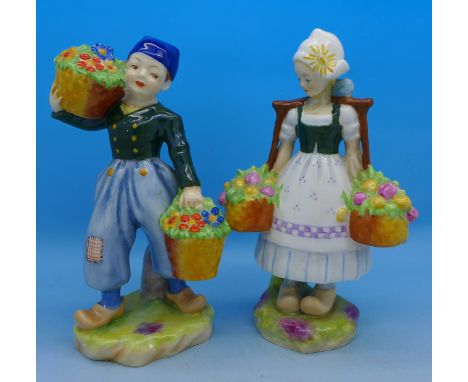 A pair of Royal Worcester figures, Dutch boy and Dutch girl, 2923 and 2922, girl restored
