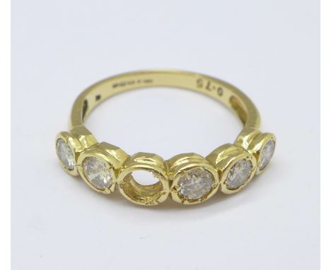 An 18ct gold and diamond ring, 2.7g, L, lacking one stone