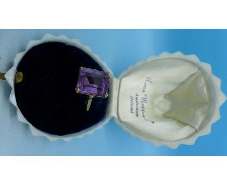 A 14ct gold and amethyst ring marked 585, with receipt dated 25.7.1963, and original Van Moppes & Zoon of Amsterdam box, 4.6g