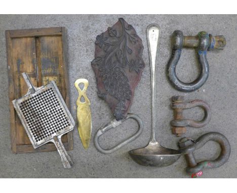 An Indian printing block, a metal printing tool marked Monotype, a plated ladle, etc.