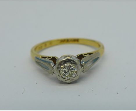 An 18ct gold and platinum set Art Deco diamond solitaire ring, 2.9g, L