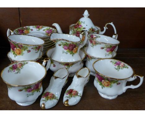 A Royal Albert Old Country Roses six setting tea service, six cups, saucers, side plates, teapot, sugar and cream