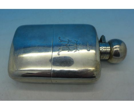 A silver hip flask, George Unite, Birmingham 1918, with monogram