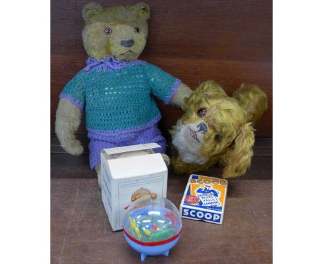 A plush jointed Teddy bear with jointed limbs, straw filled body and a similar plush dog with straw filled body, a pack of Sc