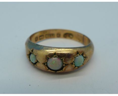 A 9ct gold and three stone opal ring, Birmingham 1901, 1.4g, M