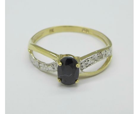 A 9ct gold, sapphire and diamond ring, 0.9g, O