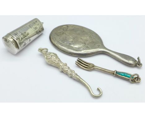 A silver cheroot holder case, Birmingham 1905, a small silver mirror back a/f, a button hook and a fork