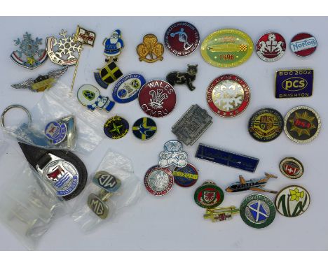 A collection of badges and cufflinks