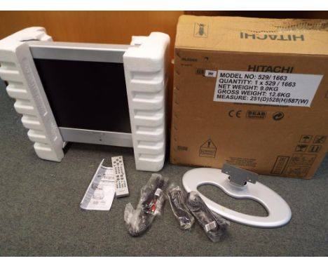 A Hitachi 20 inch flat screen LCD television, model No. 529/1663, with remote control, instruction leaflet and cables, in ori