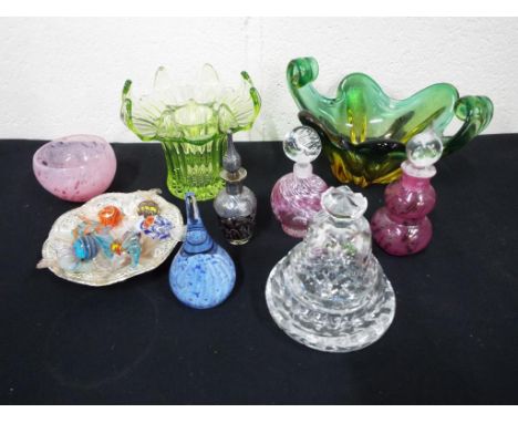 A mixed lot of glass tableware, perfume bottles and other featuring a selection of glass Murano sweets, a uranium glass vase,