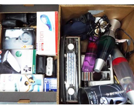 A large quantity of electrical goods to include a steam iron, clippers, a range of cameras to include Minolta, a selection of