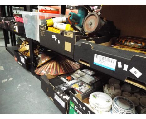 A large quantity of household items and CDs, ceramic tableware to include vintage teacups and saucers, vintage football books